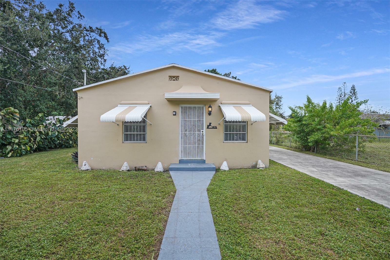 Property Photo:  1876 NW 59th St  FL 33142 