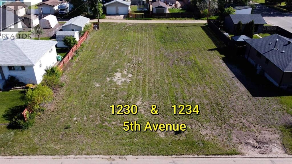 Property Photo:  301234 5 Avenue  AB T9W 1L8 