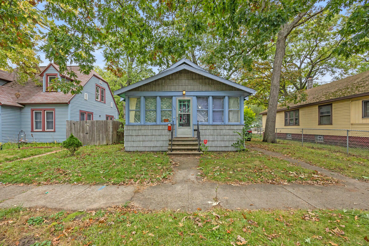 Property Photo:  1636 Wood Street  MI 49442 