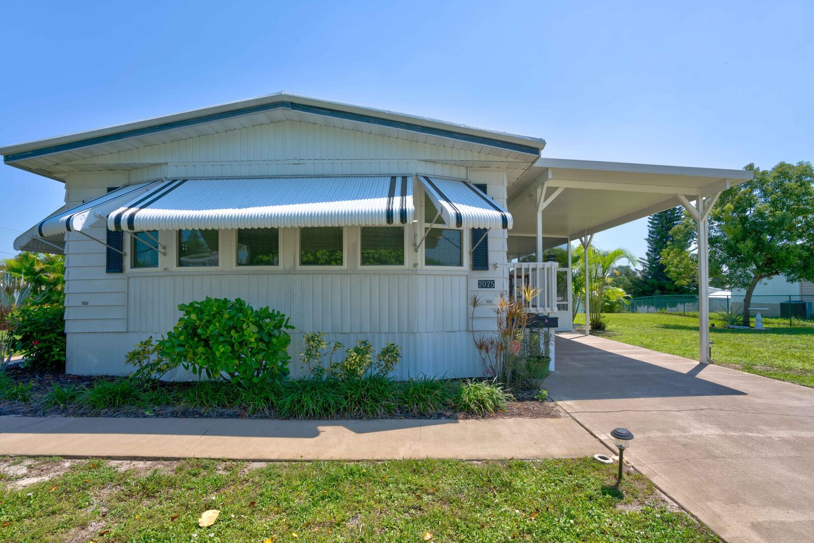Property Photo:  7075 SE Bluebird Circle  FL 33455 