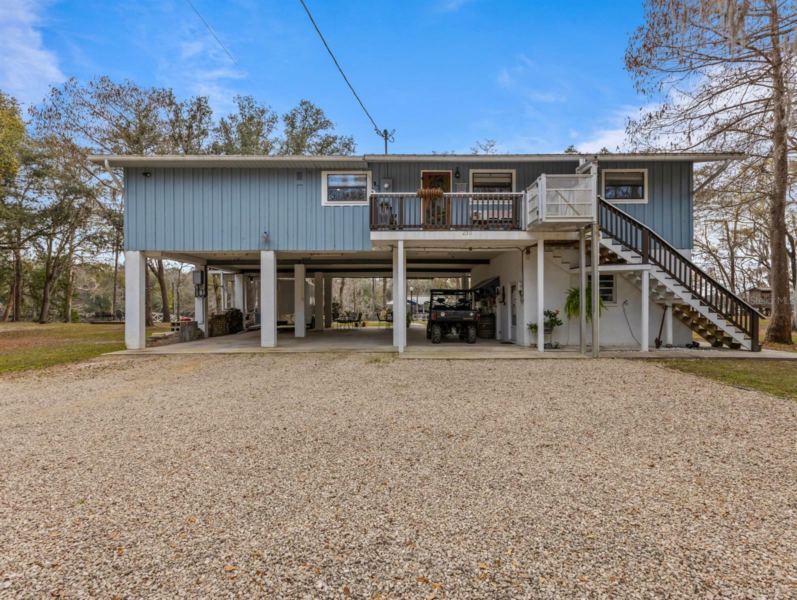 Property Photo: 230 SE 139th Avenue FL 32680