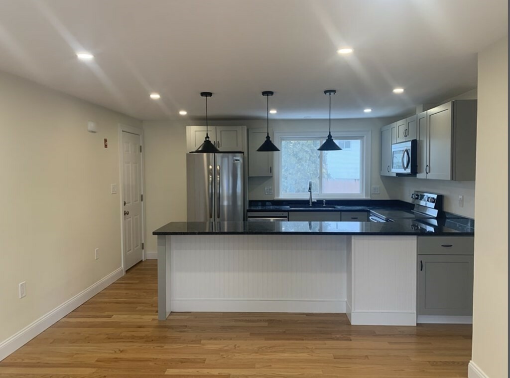 Property Photo: 9-11 Marion Road 9 MA 01730