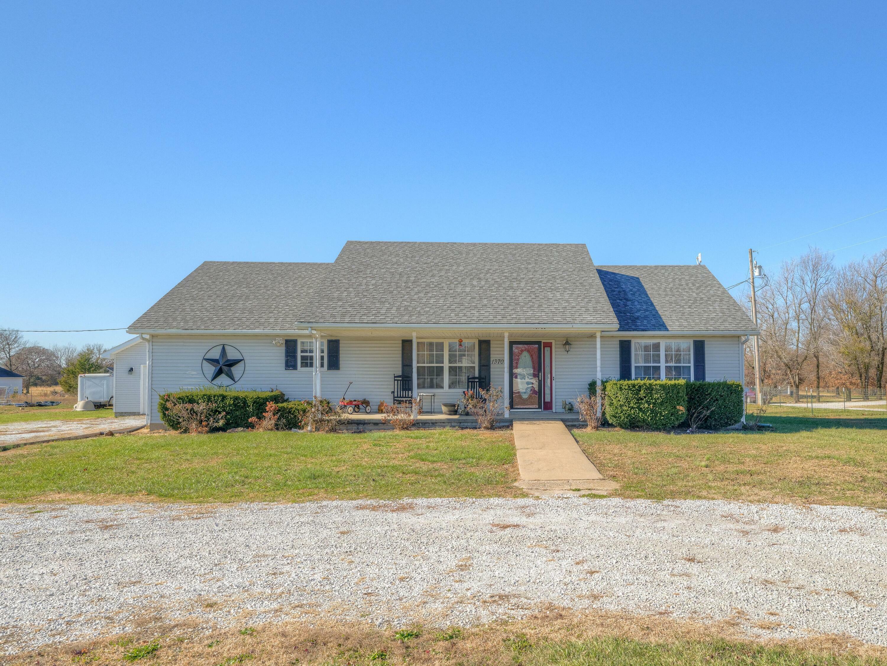 Property Photo:  13702 Jay Drive  MO 64850 