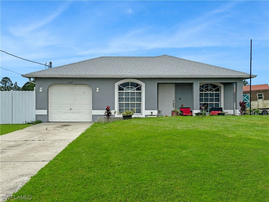 Property Photo:  824 Lamar Street E  FL 33974 