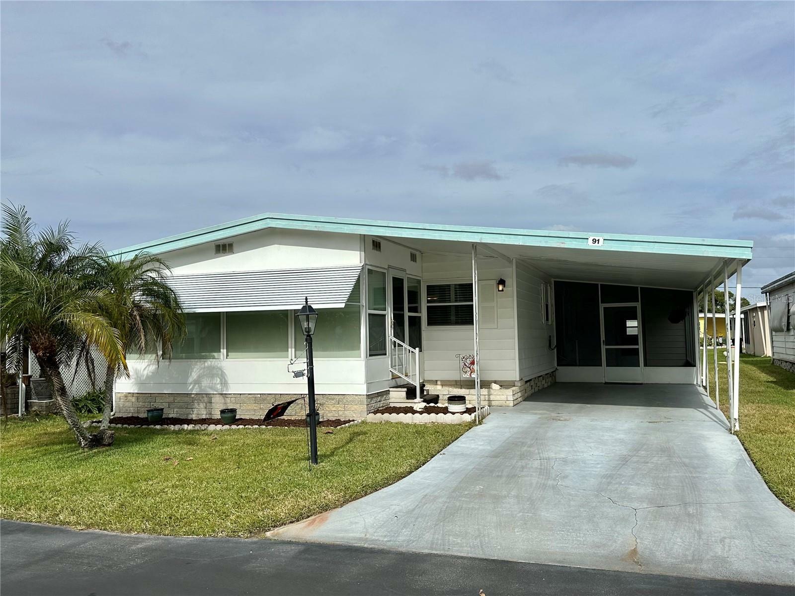 Property Photo:  1401 W Highway 50 91  FL 34711 