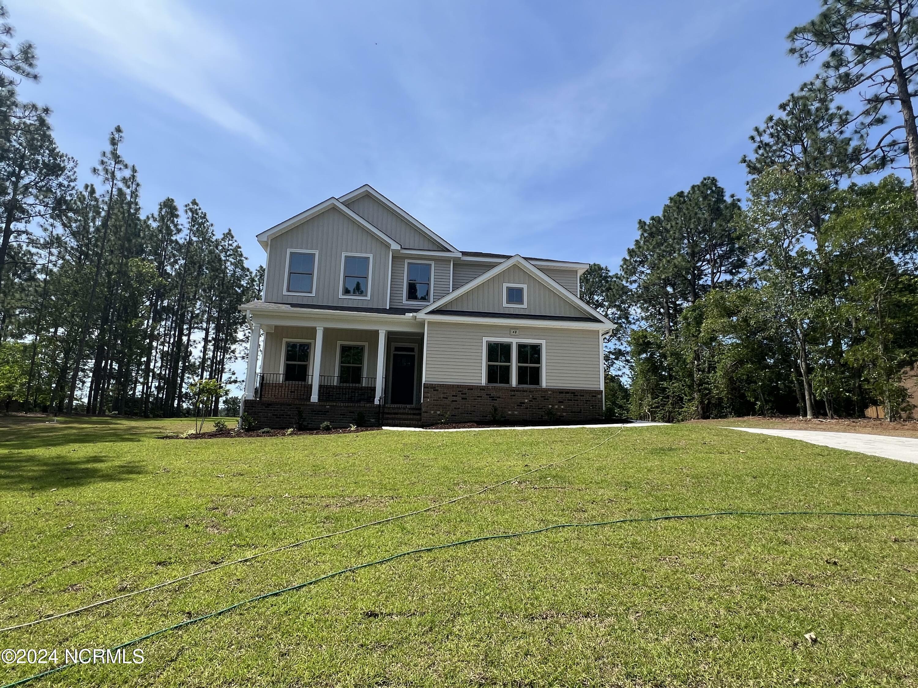 Property Photo:  48 Woodland Circle  NC 27281 