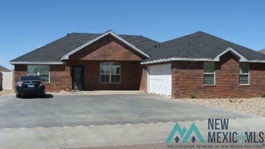 Property Photo: 1347 Oakwood Circle NM 88130