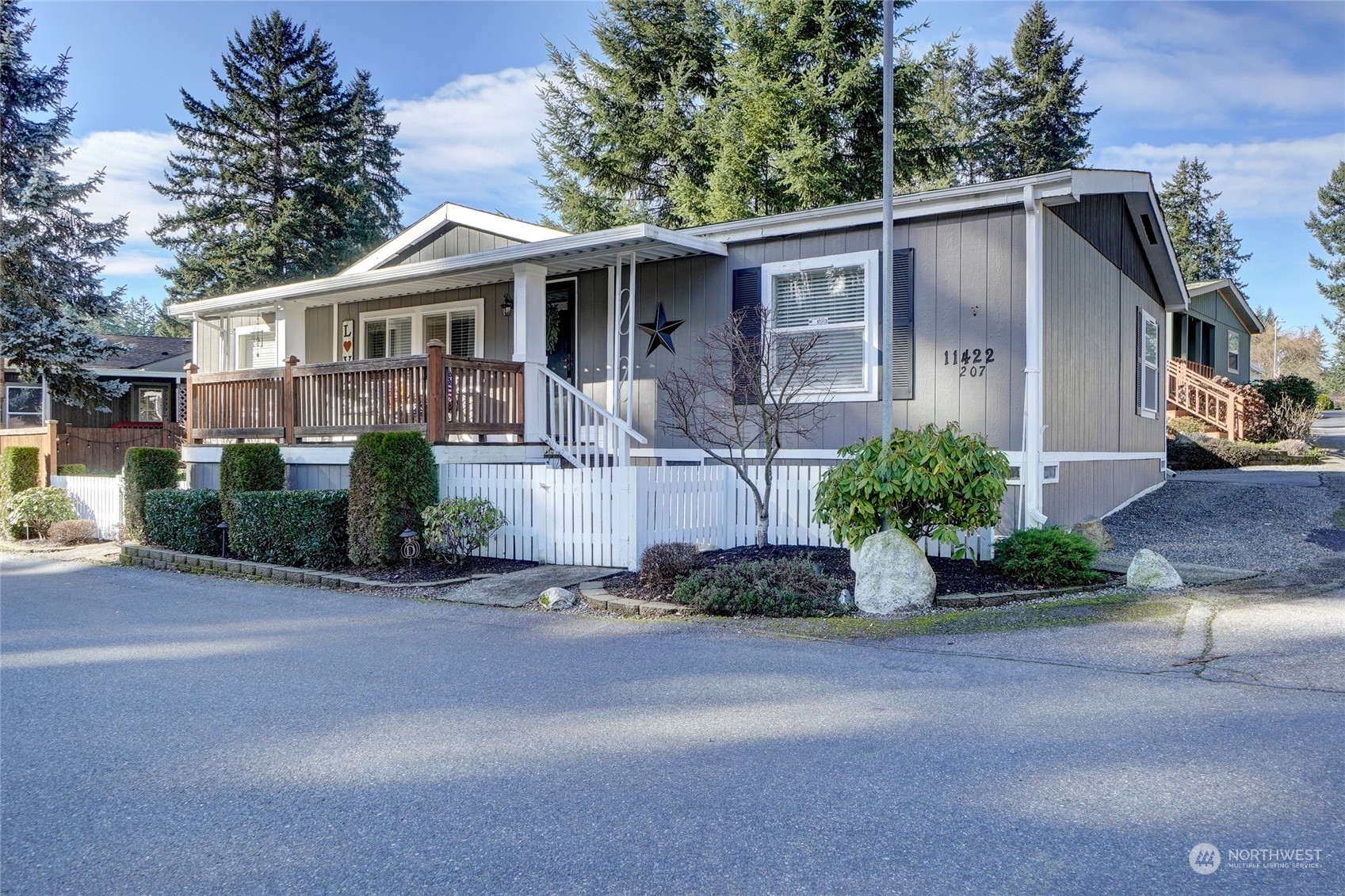 Property Photo:  11422 125th Street Ct E 207  WA 98374 