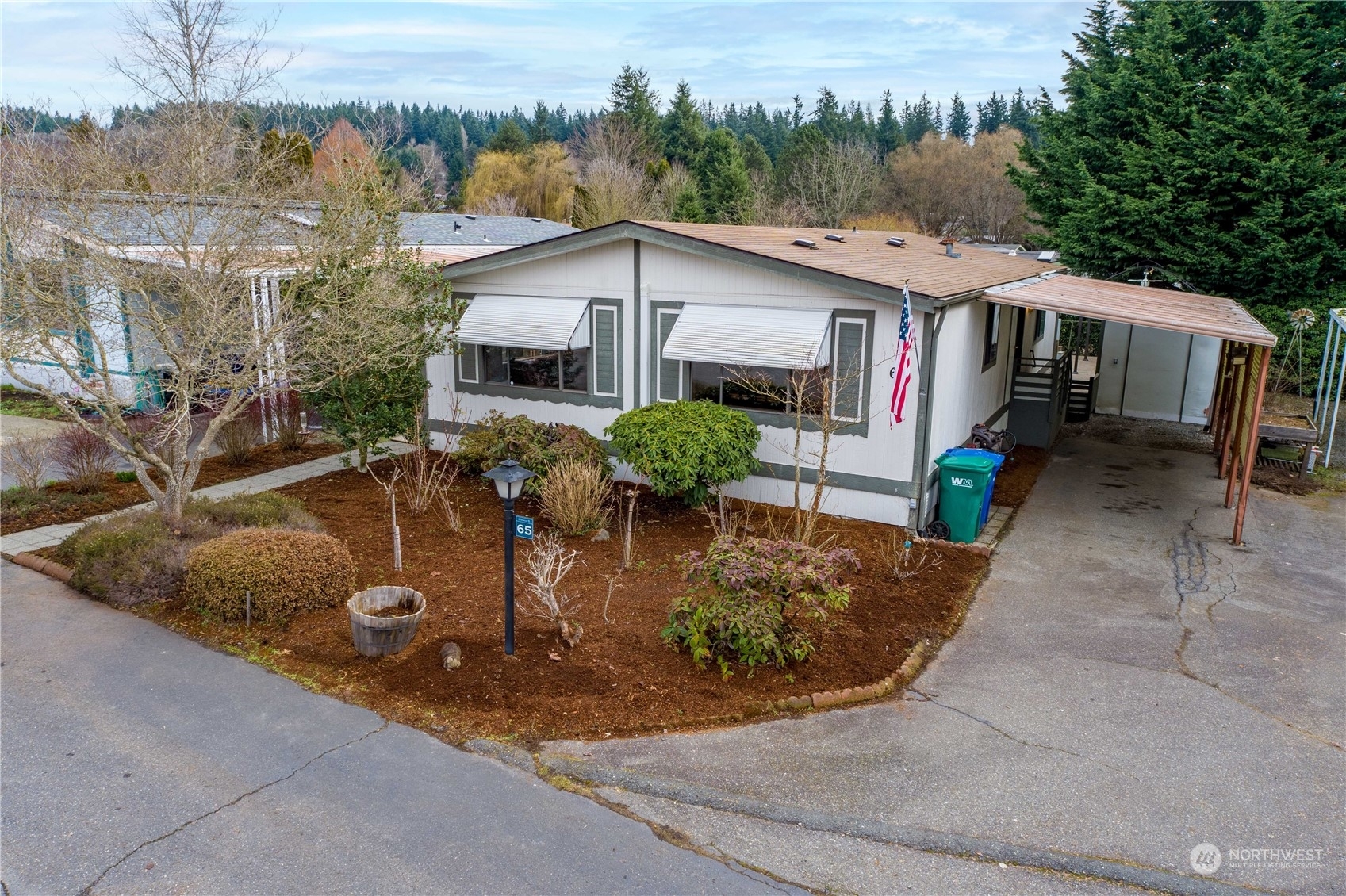 Property Photo:  1121 244th Street 65  WA 98021 