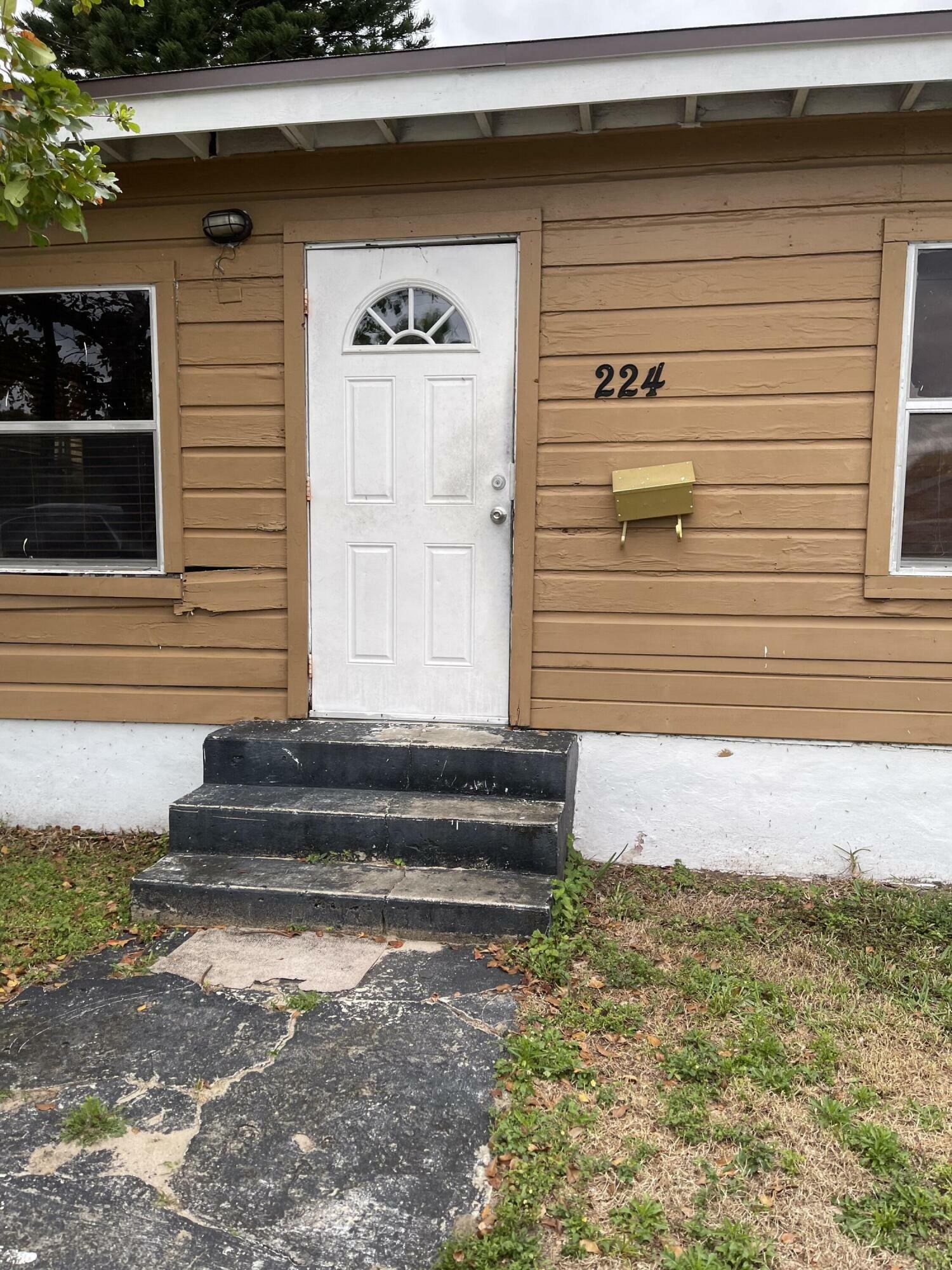 Property Photo:  224 NW 4th Avenue  FL 33444 