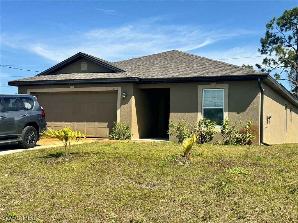 Property Photo:  2115 NW 24th Place  FL 33993 