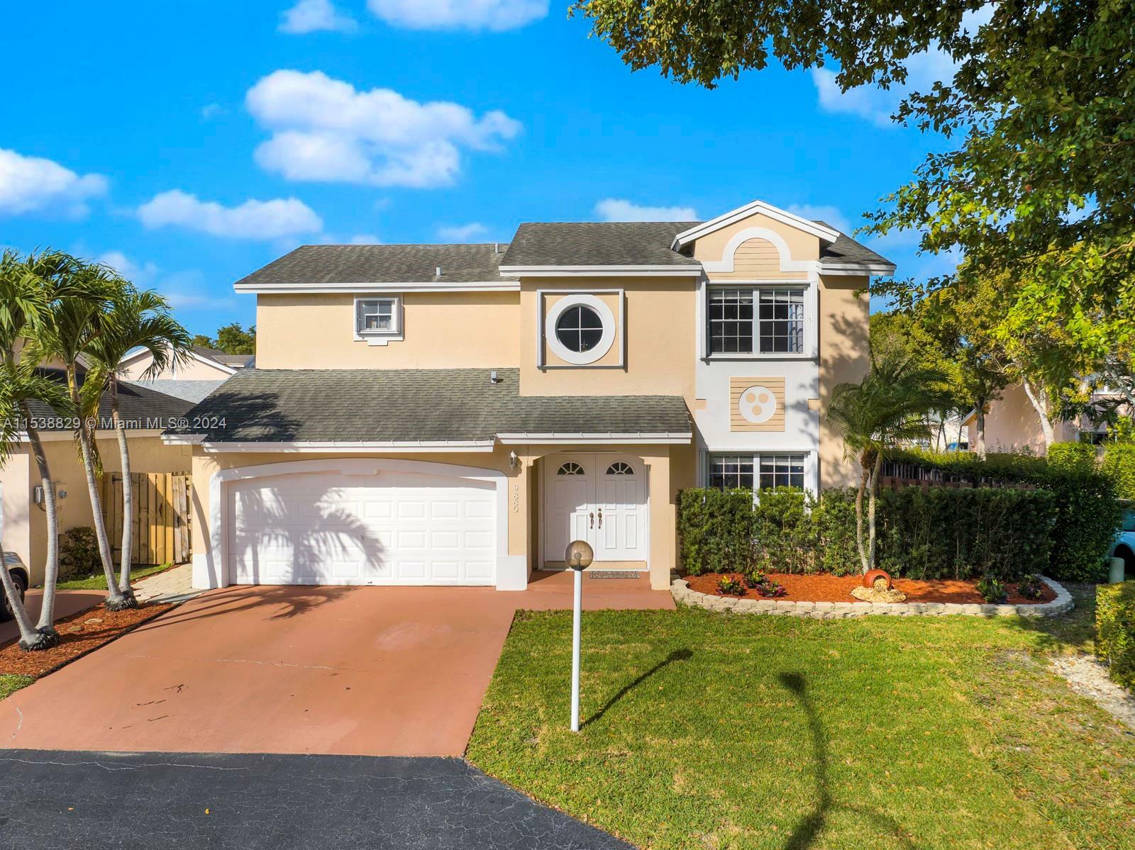 Property Photo:  9880 NW 51st Ter  FL 33178 