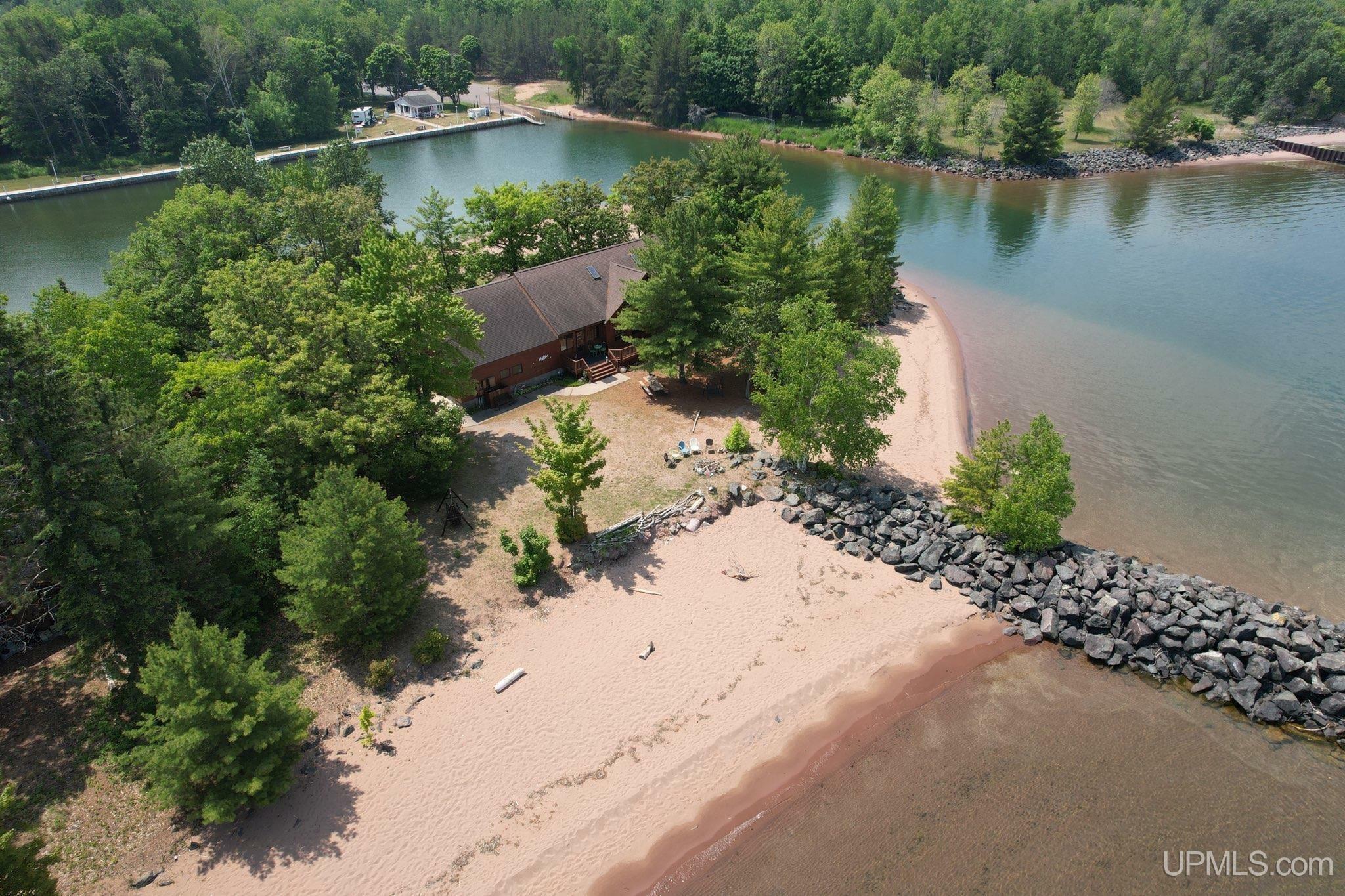 Property Photo:  4030 Squaw Beach  MI 49808 