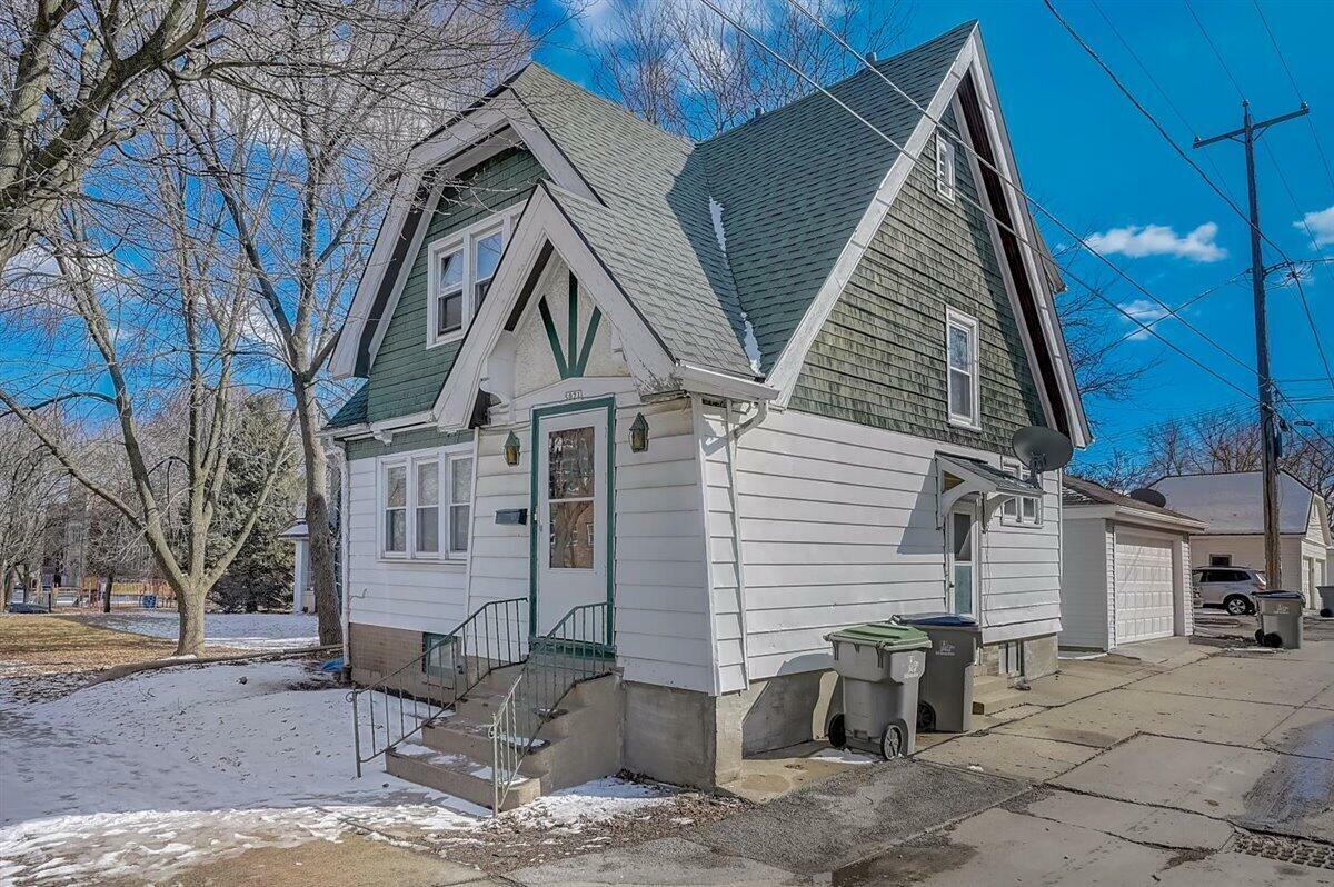 Property Photo:  5021 W Garfield Ave  WI 53208 