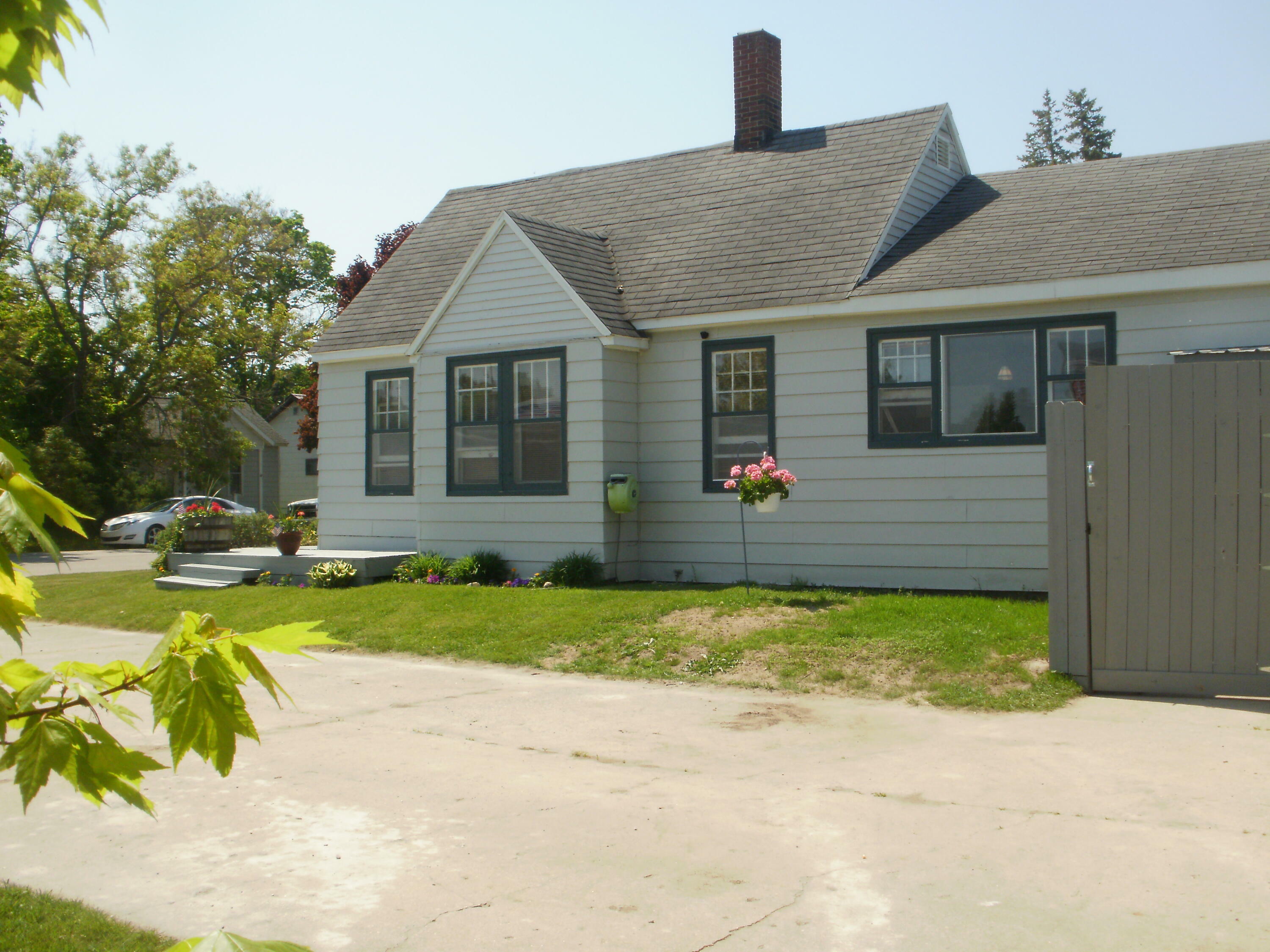 Property Photo:  106 S C   Street  MI 49721 