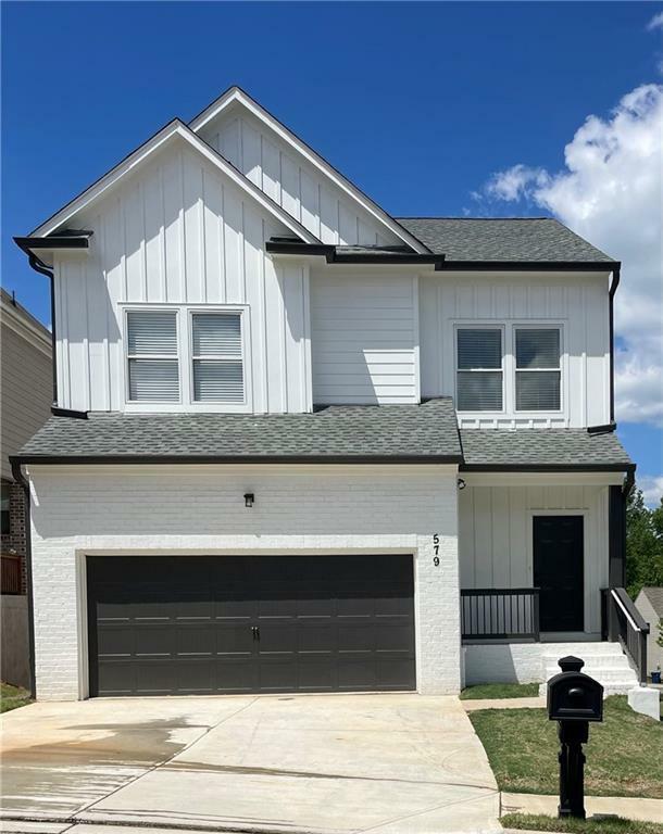 Property Photo: 579 Hardy Water Drive GA 30045