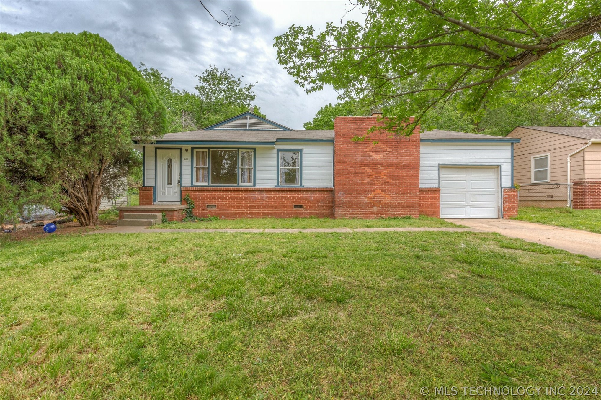 5026 N Denver Place  Tulsa OK 74126 photo