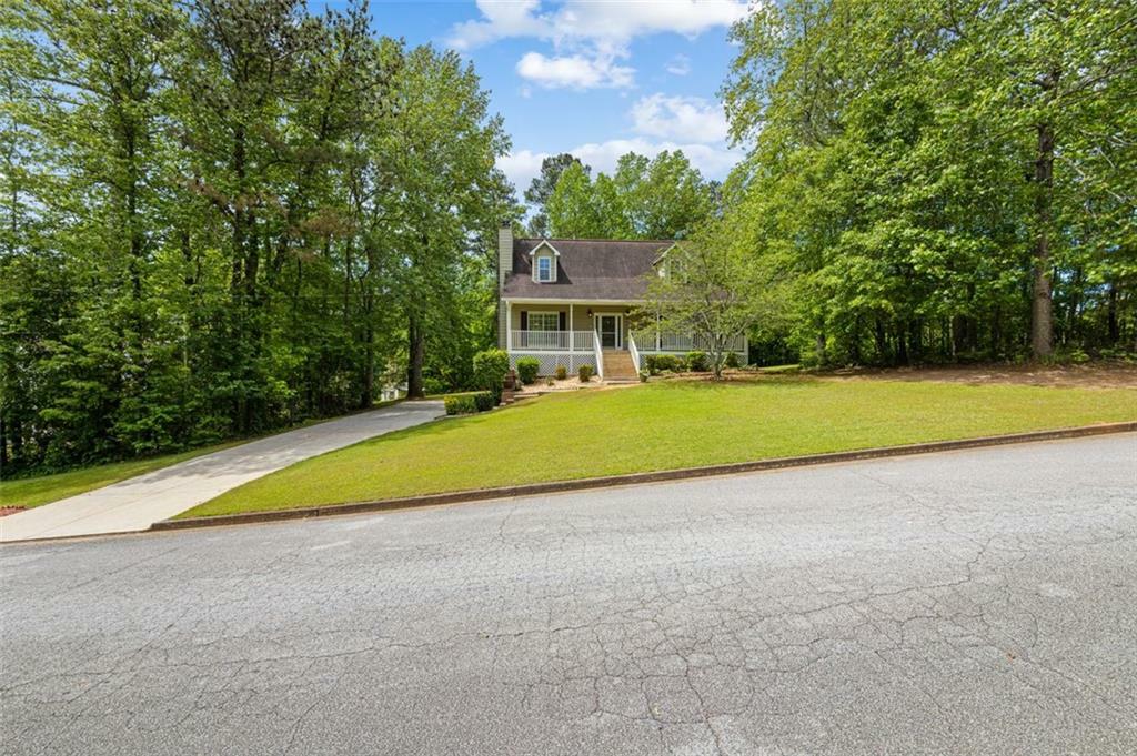 Property Photo:  8627 Foxridge Drive  GA 30187 