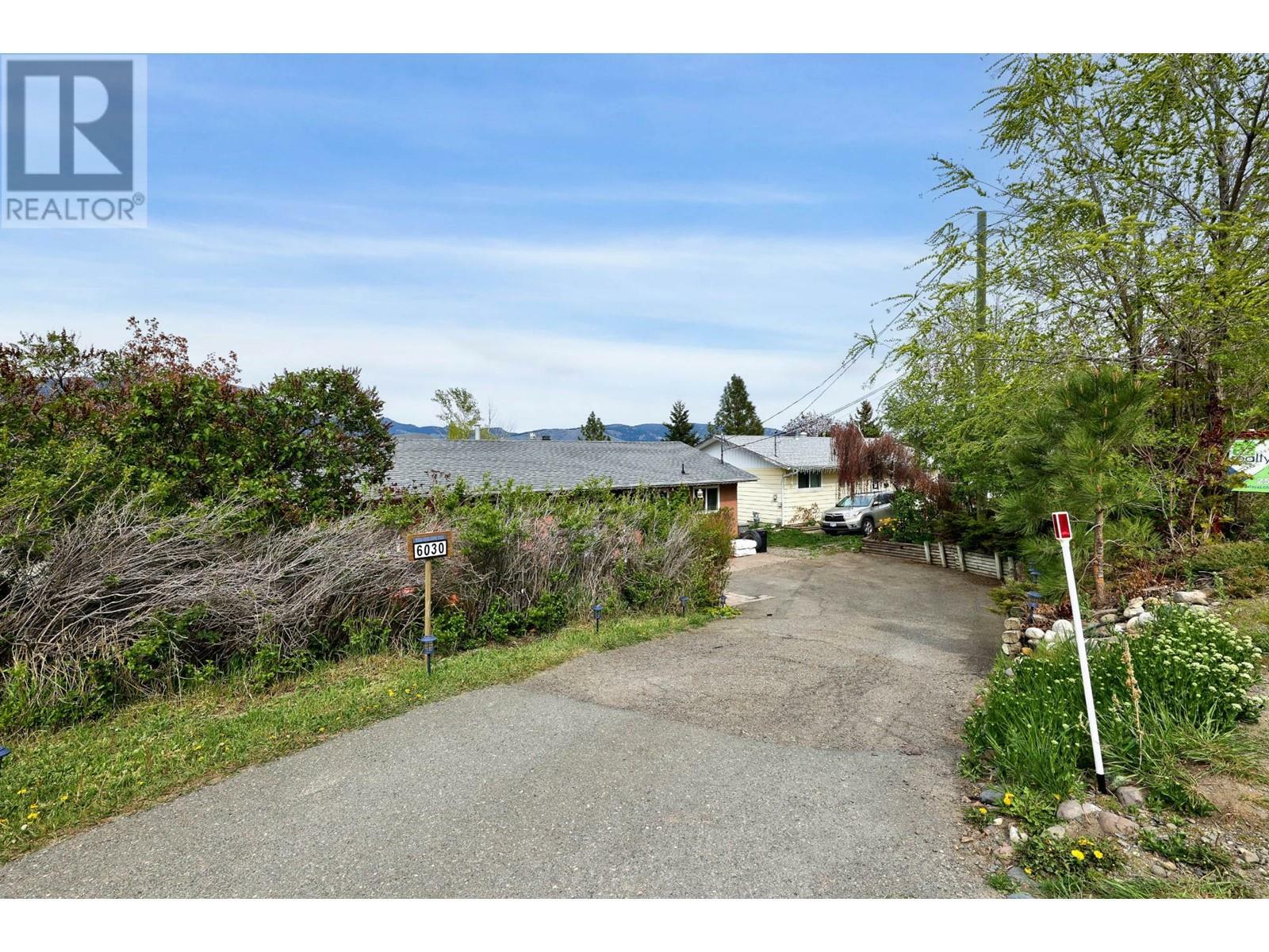 Property Photo:  6030 Meadowland Cres S  BC V2C 6X3 