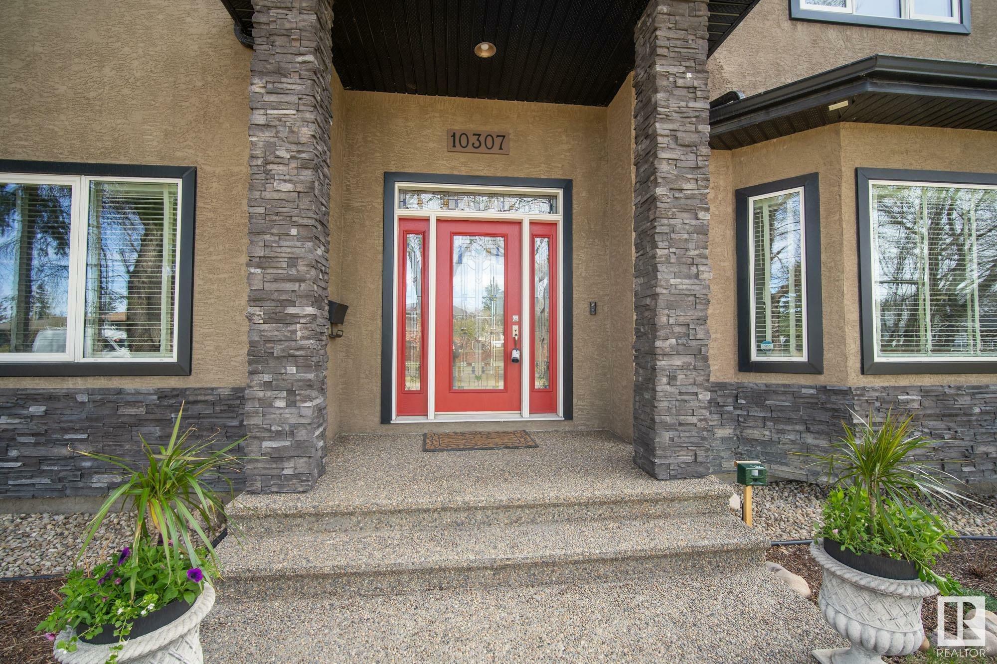 Property Photo:  10307 74 Street NW  AB T6A 2Y4 