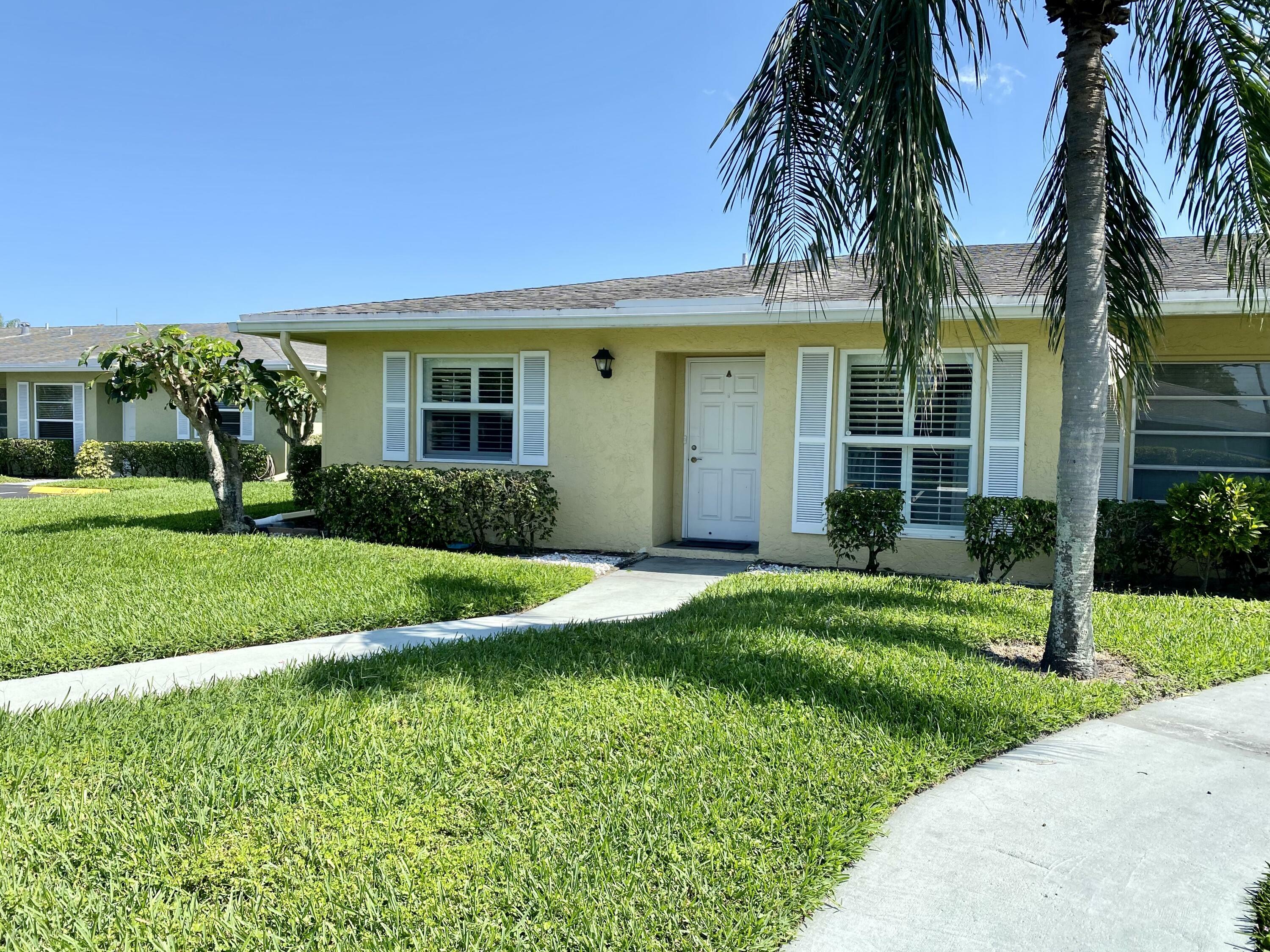 Property Photo:  2401 E Palm Lane A  FL 33445 