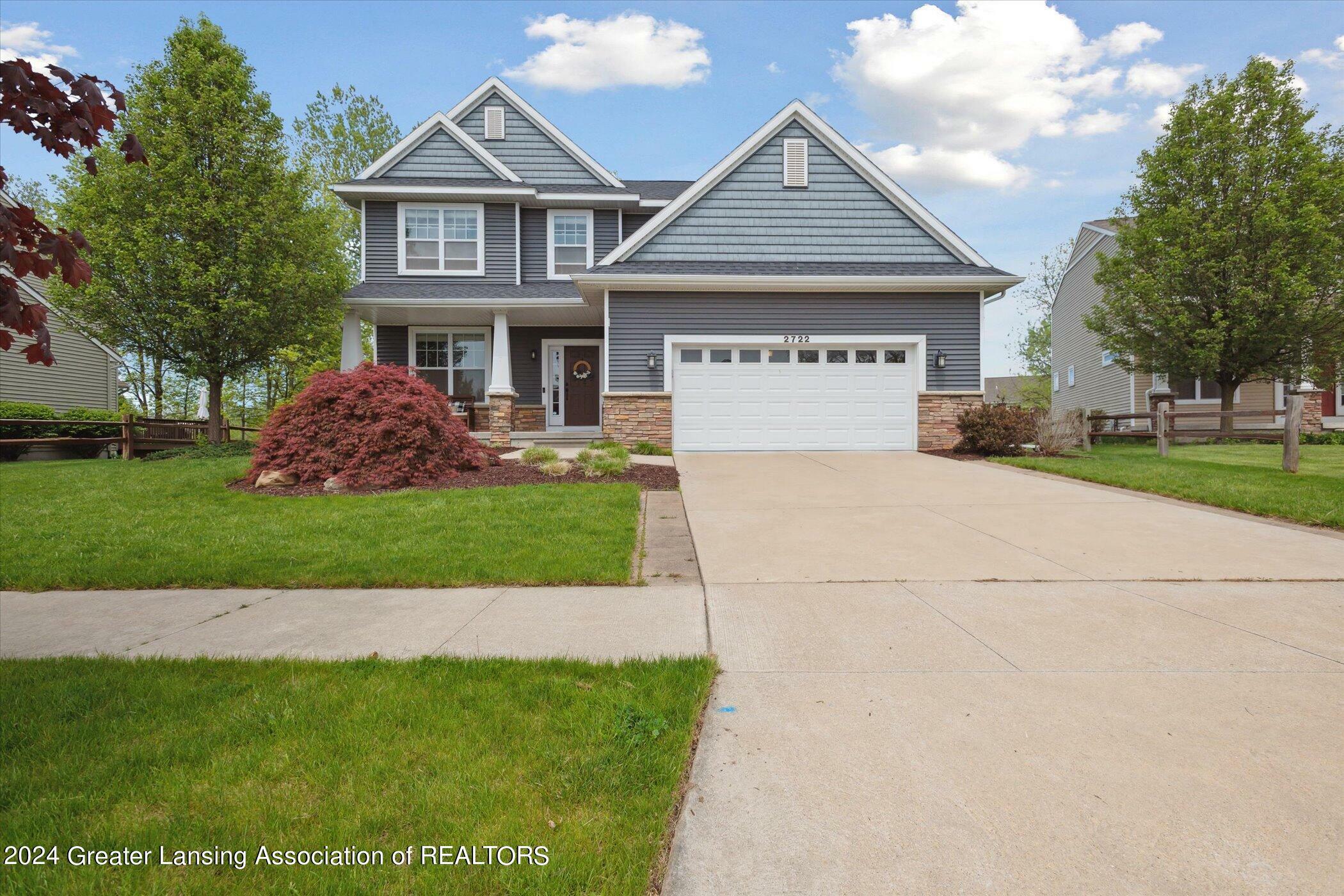 Property Photo:  2722 Lupine Drive  MI 48864 