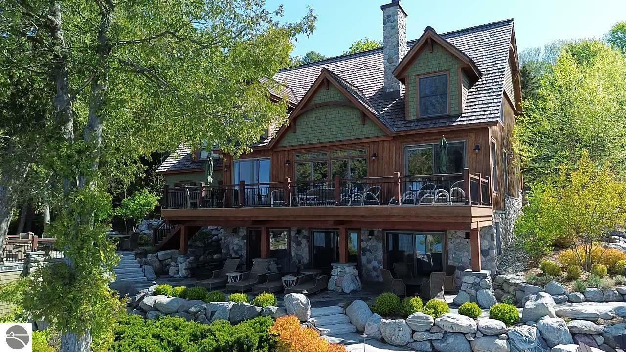 Property Photo:  4777 NE Torch Lake Drive  MI 49622 