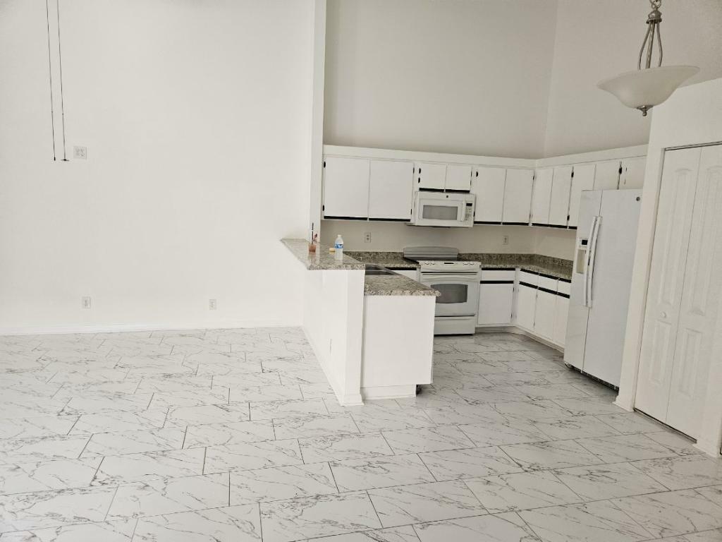 Property Photo:  4387 Woodstock Drive B  FL 33409 