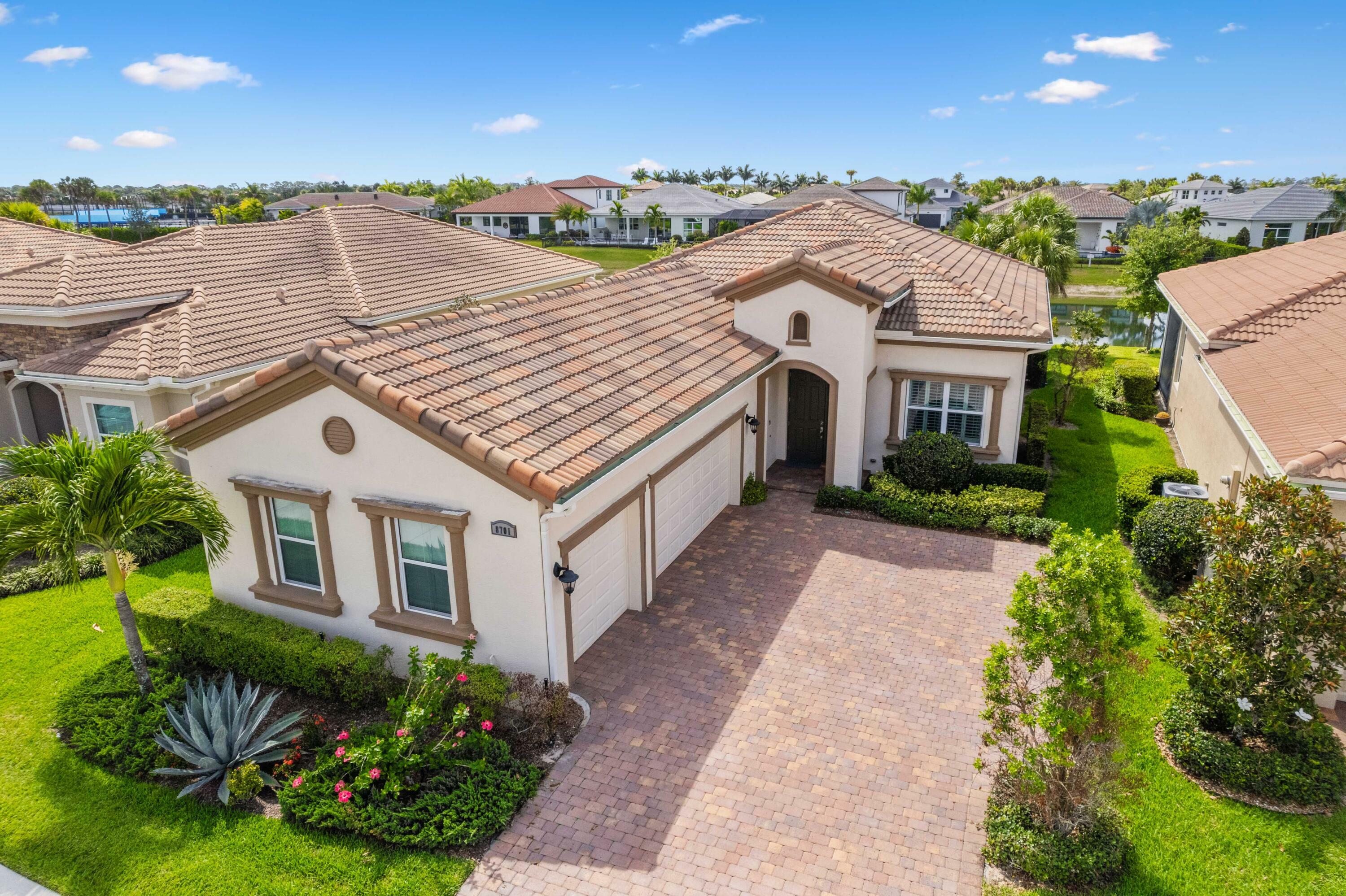 Property Photo:  8701 SW Carrara Way  FL 34987 