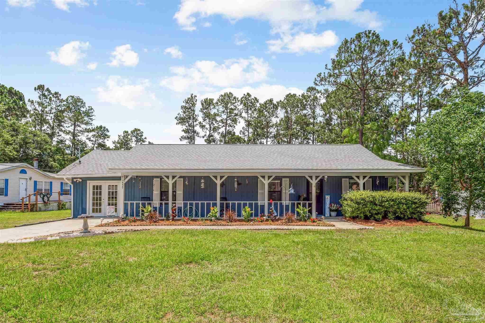 Property Photo:  12229 Ailanthus Ct  FL 32506 