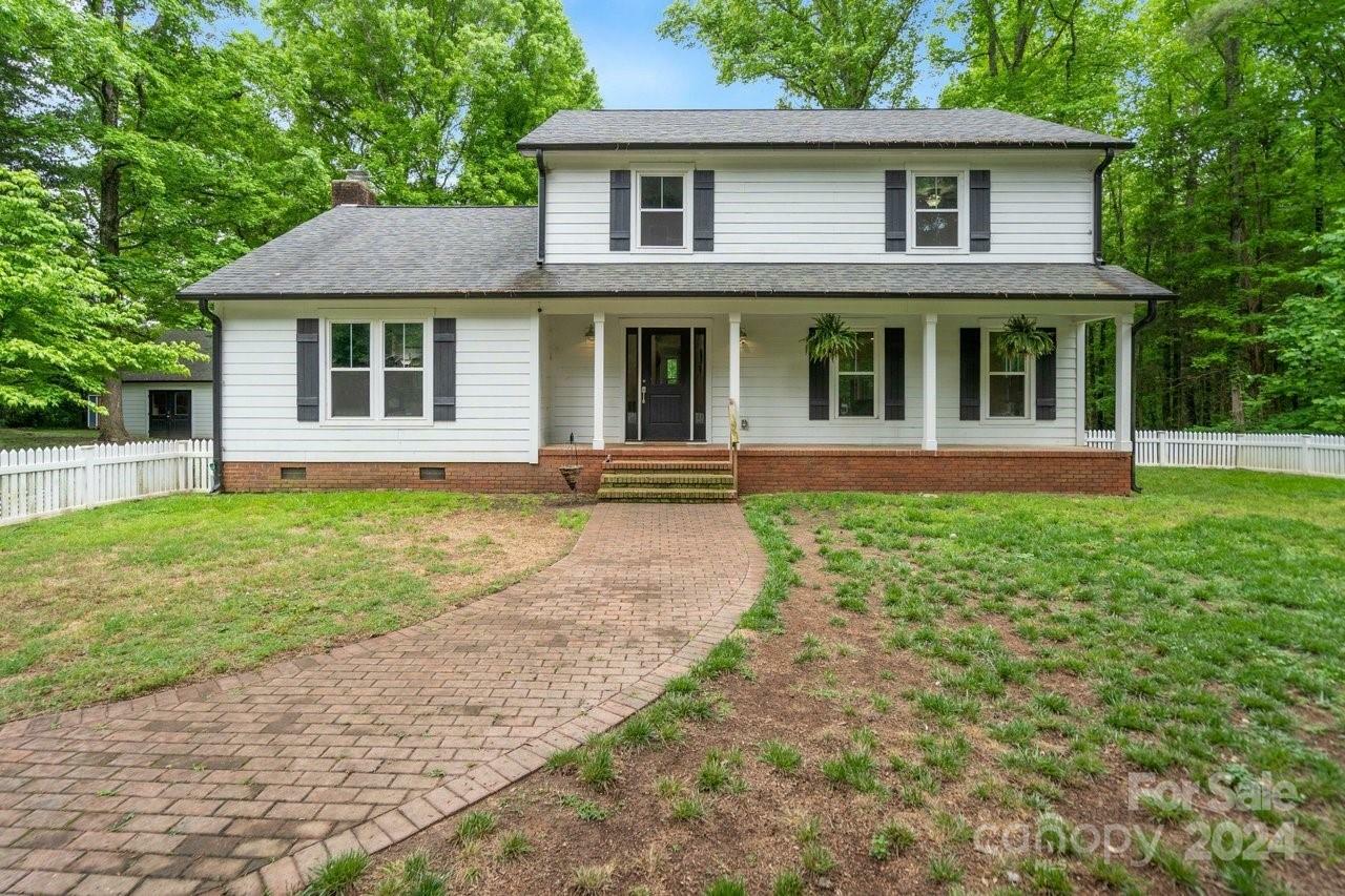 Property Photo:  15016 Rocky River Road  NC 28036 