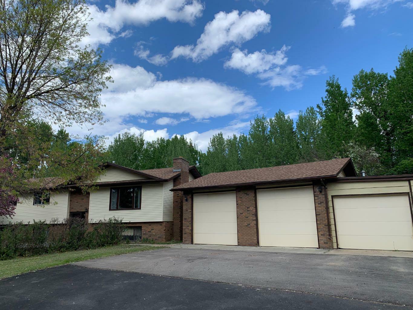 Property Photo: 593077 Range Road 121 AB T7S 1P1