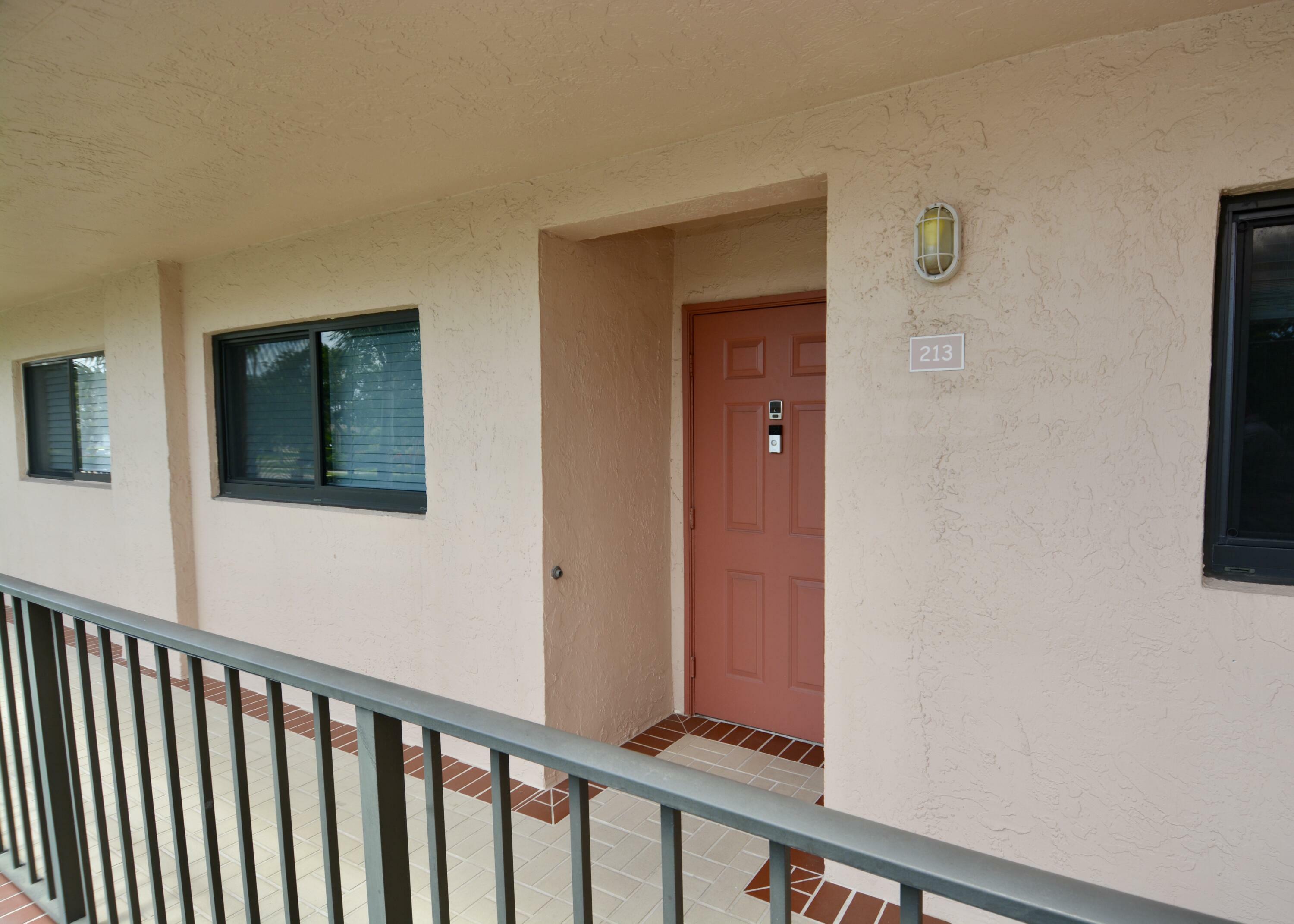 Property Photo:  15075 Witney Road 213  FL 33484 