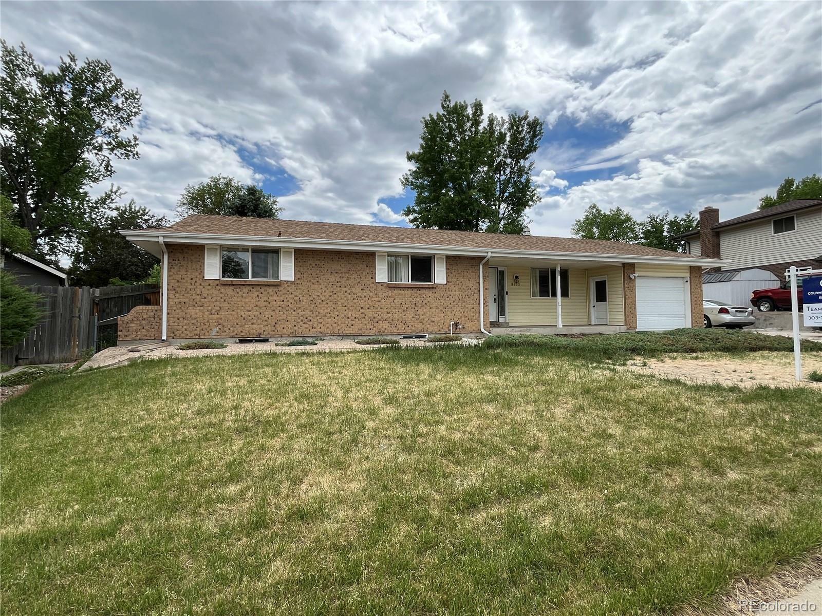 Property Photo: 8622 W Warren Lane CO 80227