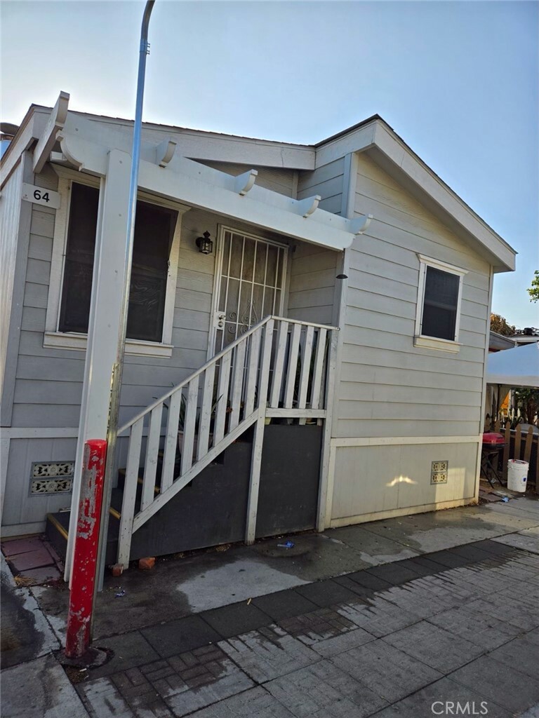 Property Photo:  12265 Woodruff Avenue 64  CA 90241 