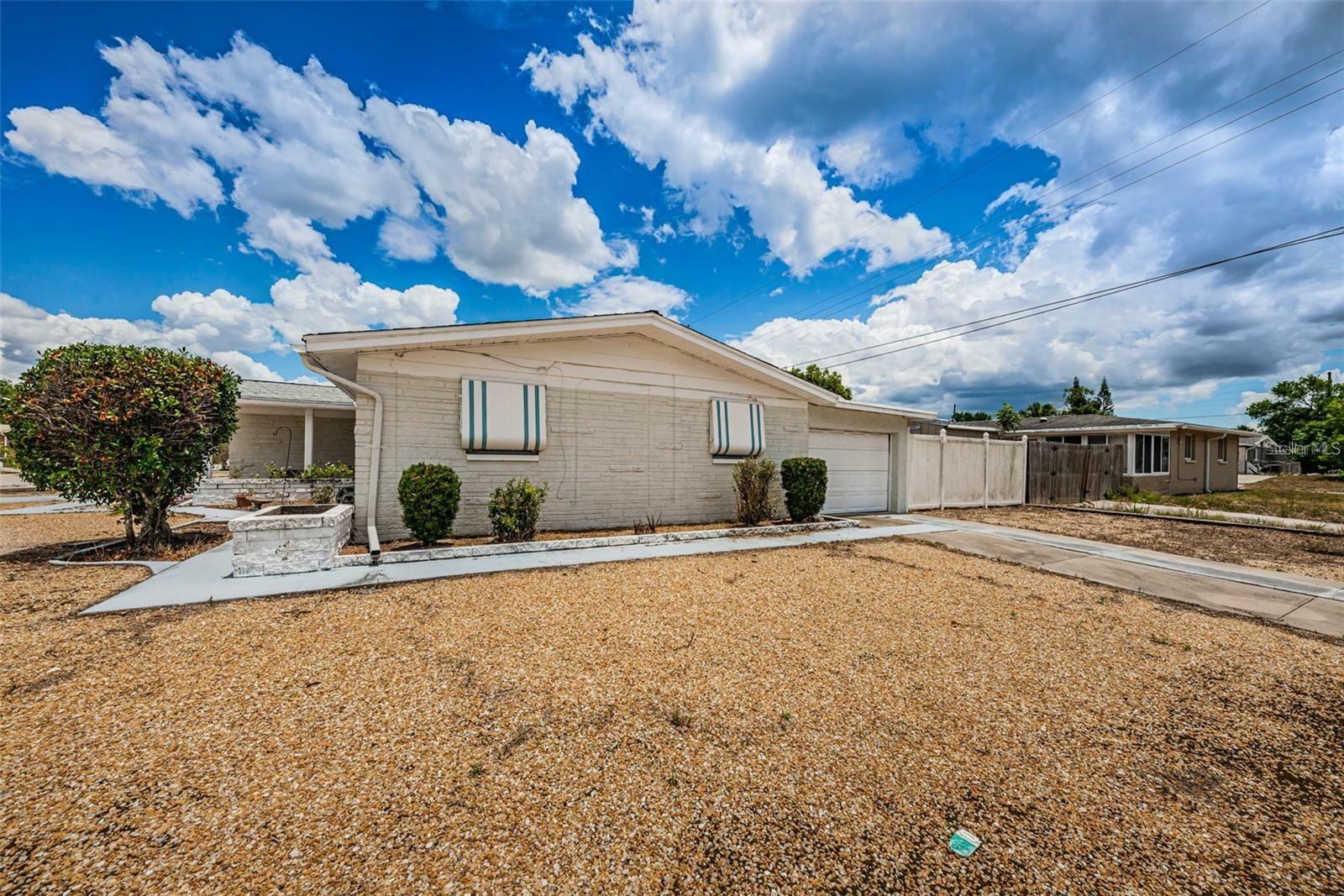 Property Photo:  4902 Vision Avenue  FL 34690 