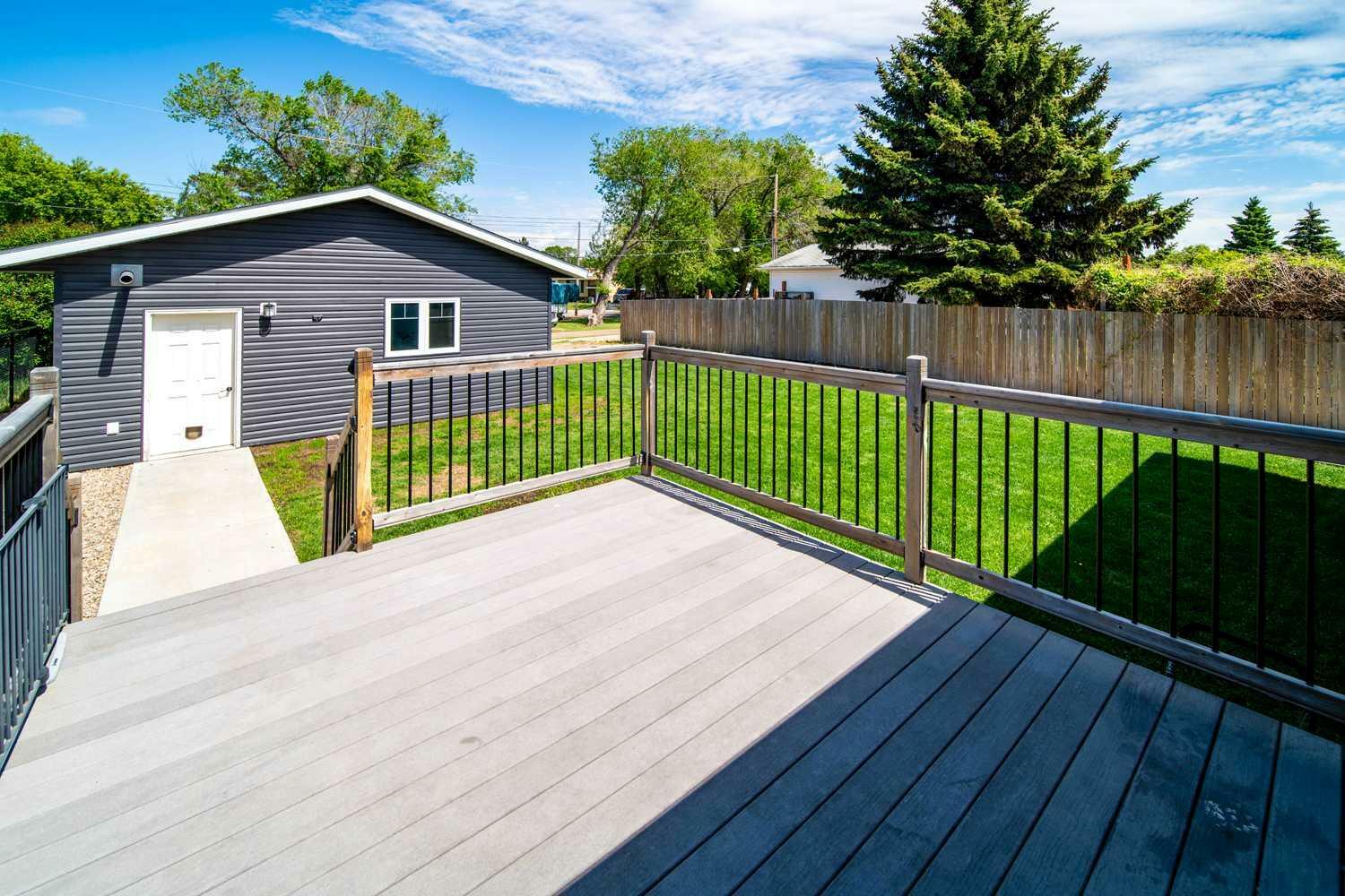 Property Photo:  1138 8 Avenue  AB T9W 1E9 