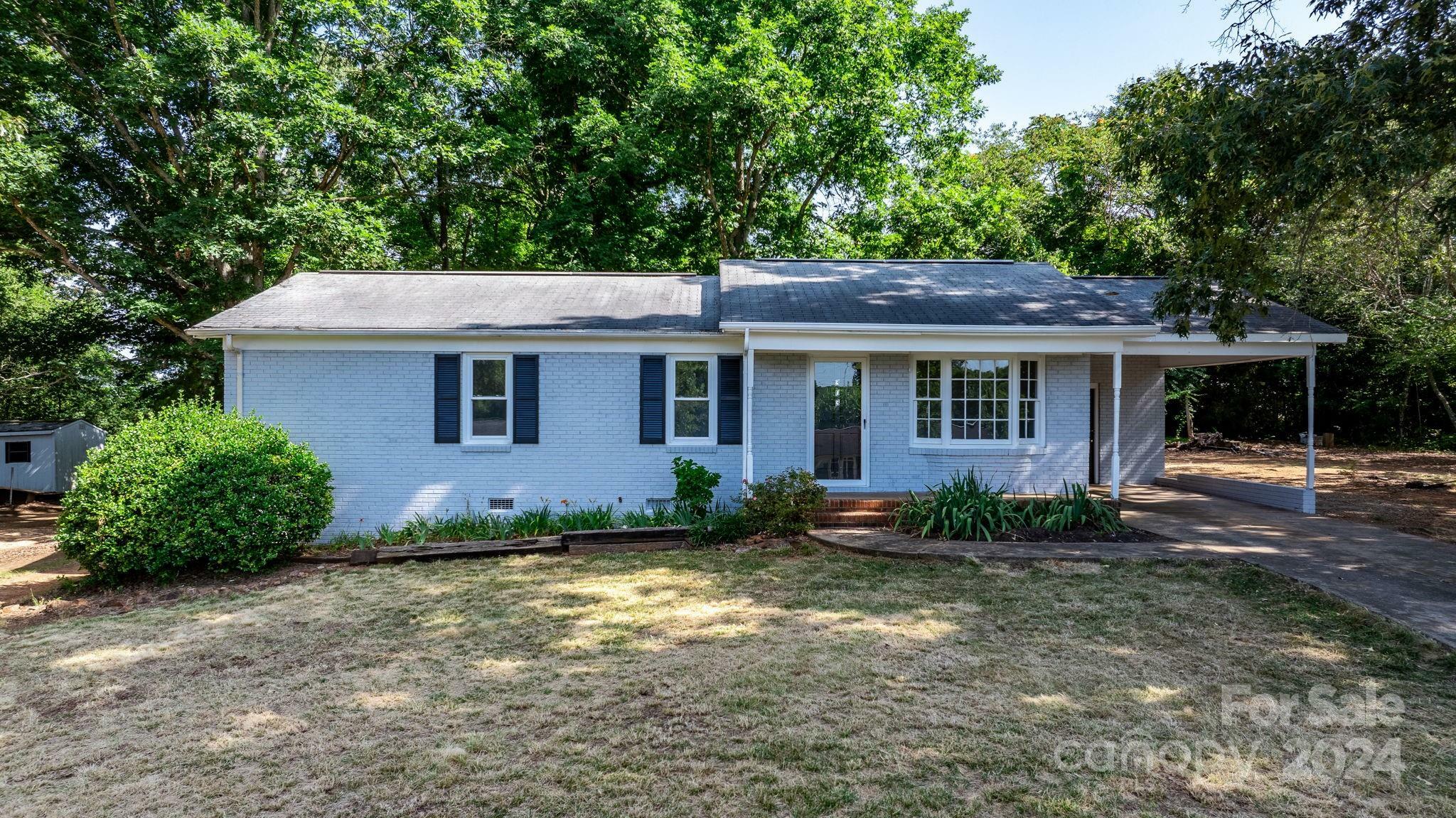 Property Photo:  303 Cedarwood Drive  NC 28152 