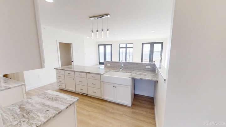 Property Photo:  2401 N Lakeshore Boulevard Unit #13 (Floor Plan J)  MI 49855 