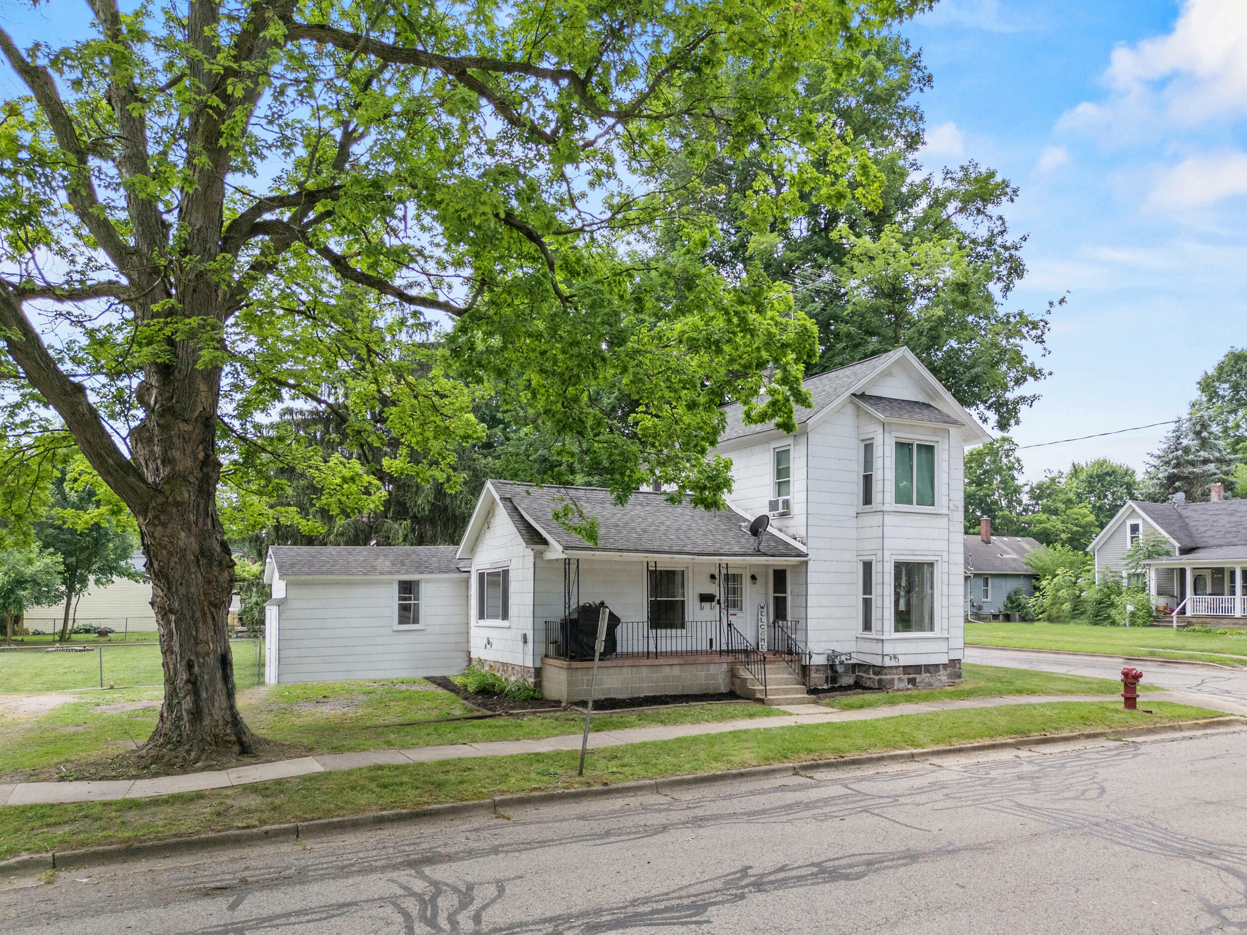 Property Photo:  110 Nash Street  MI 49345 