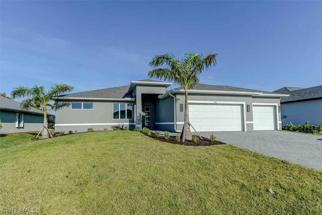 Property Photo:  428 SW 28th Place  FL 33991 