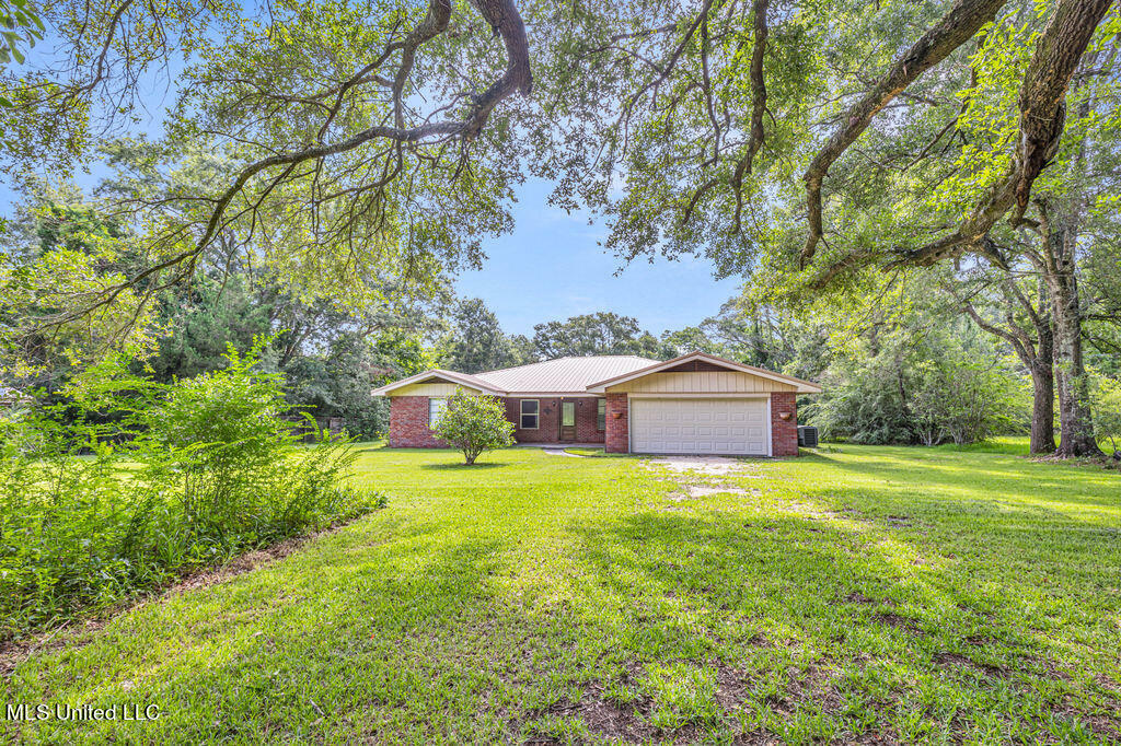 Property Photo:  20332 Red Bird Hill Road  MS 39503 