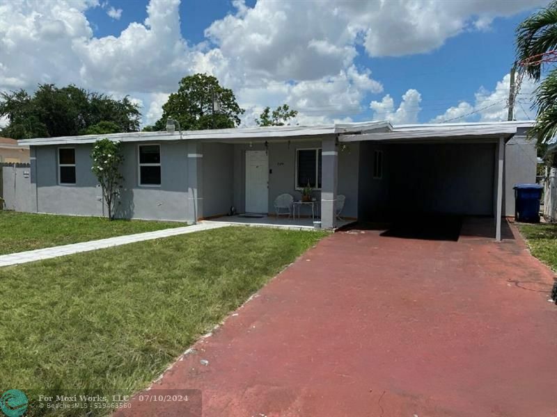 Property Photo:  9590 NW 32nd Ct  FL 33147 