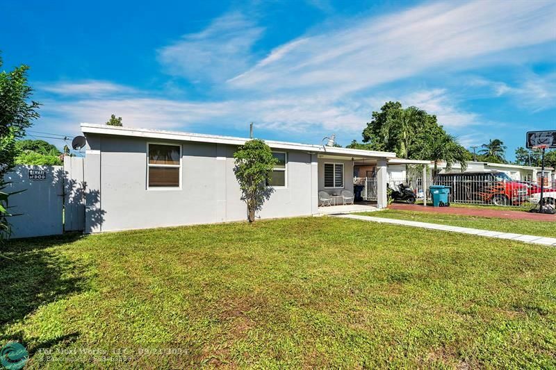 Property Photo:  9590 NW 32nd Ct  FL 33147 