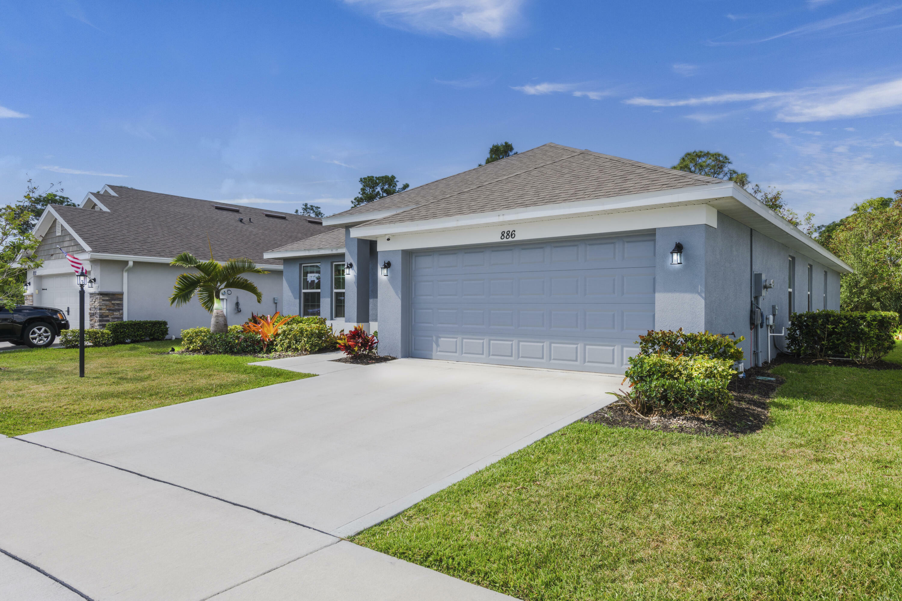 Property Photo:  886 NE Whistling Duck Way  FL 34983 