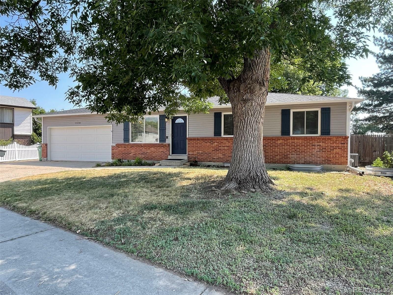Property Photo:  1530 S Queen Street  CO 80232 