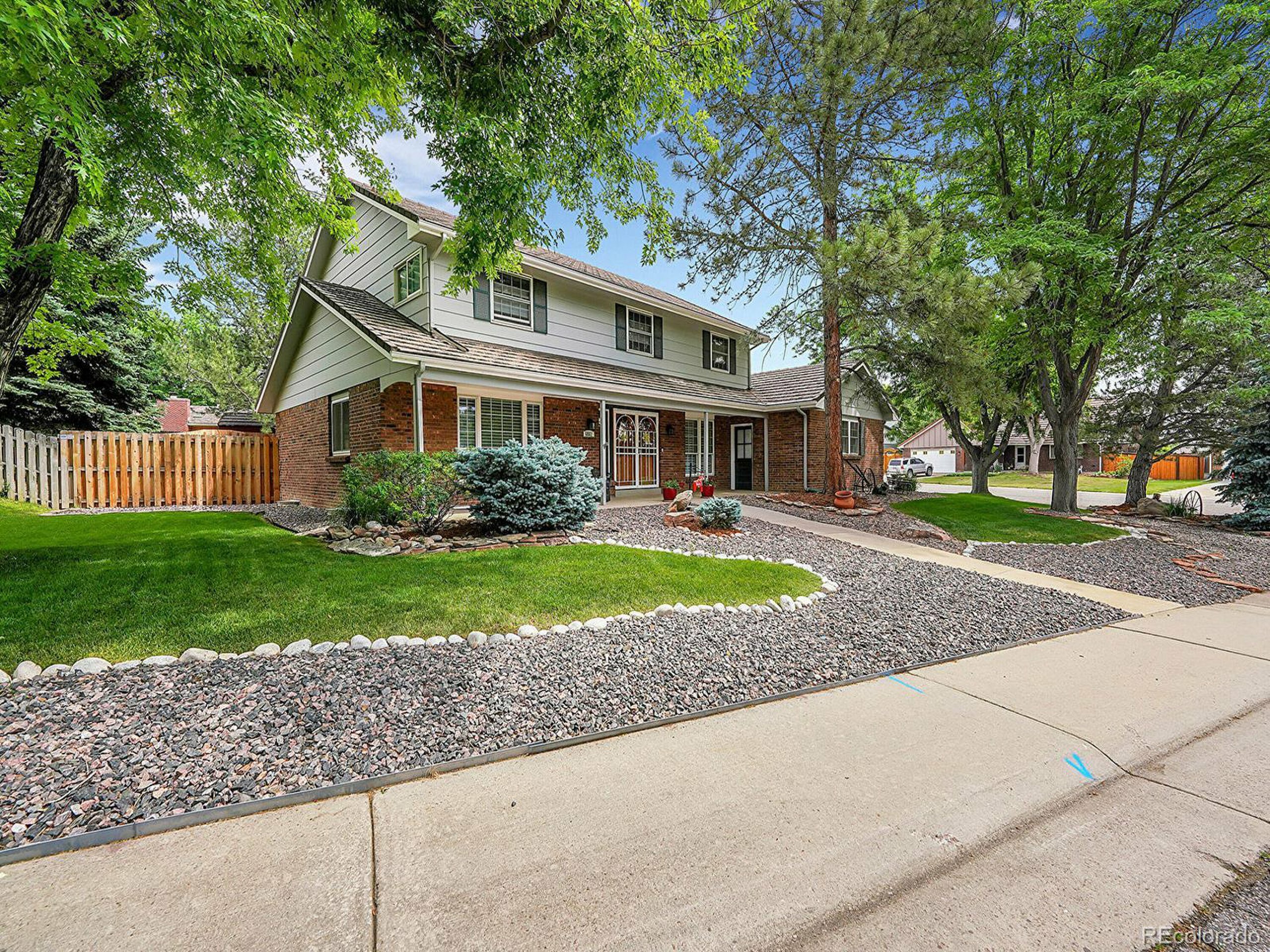 Property Photo:  6861 W Walden Pl  CO 80128 