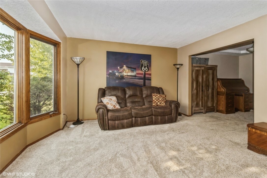 Property Photo:  701 SE Shawver Drive  IA 50111 