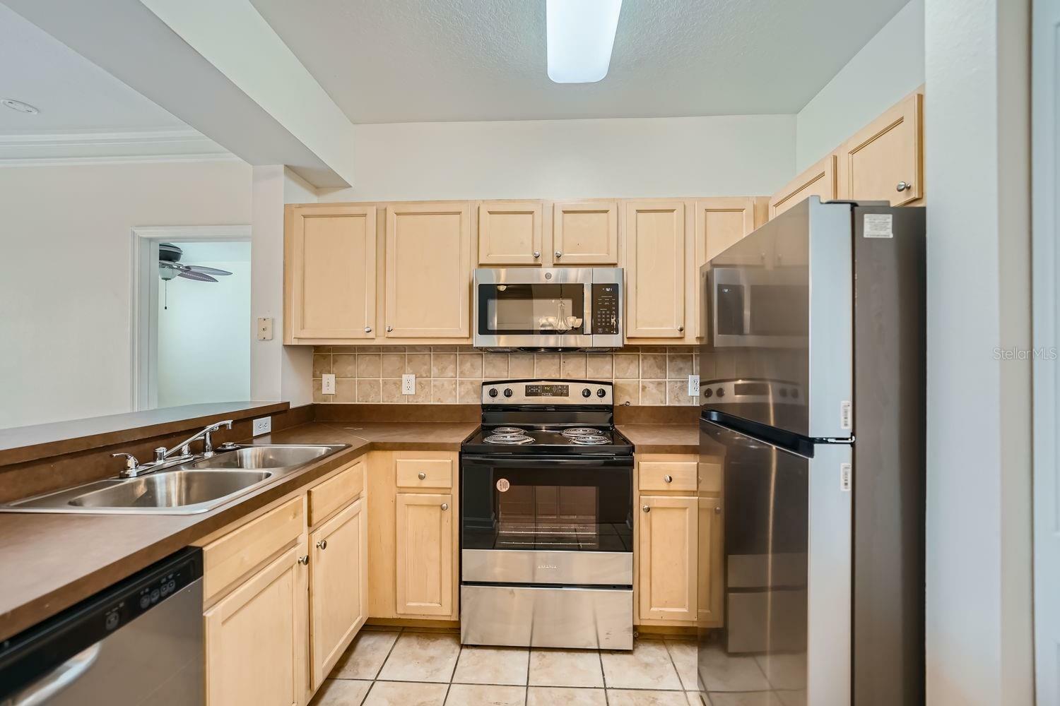 Property Photo:  12938 Penn Station Court 308  FL 32821 