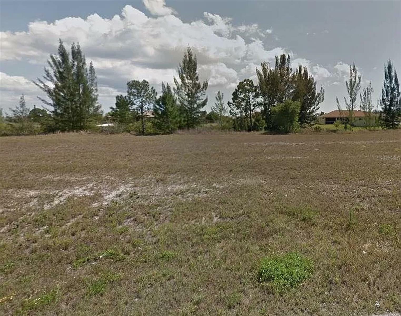 Property Photo:  2002 NW 21st Street  FL 33993 